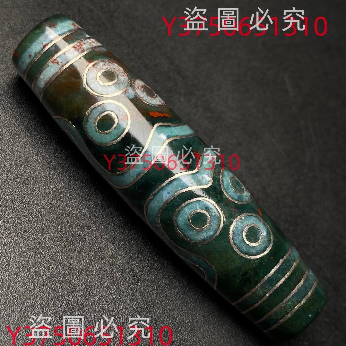 260藏區回流料鑲嵌銀絲滿朱砂十眼天珠尺寸：59*15毫重量22. 古玩收藏天