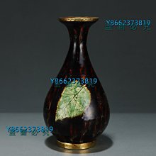 735 --- 宋代吉州窯包金黑釉樹葉紋玉壺春瓶。尺寸高：26厘米。腹徑：1