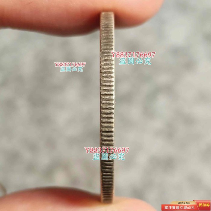 1942年美國行走女神半美元50分銀幣。銀幣重12.5g，含銀量90%。正面為