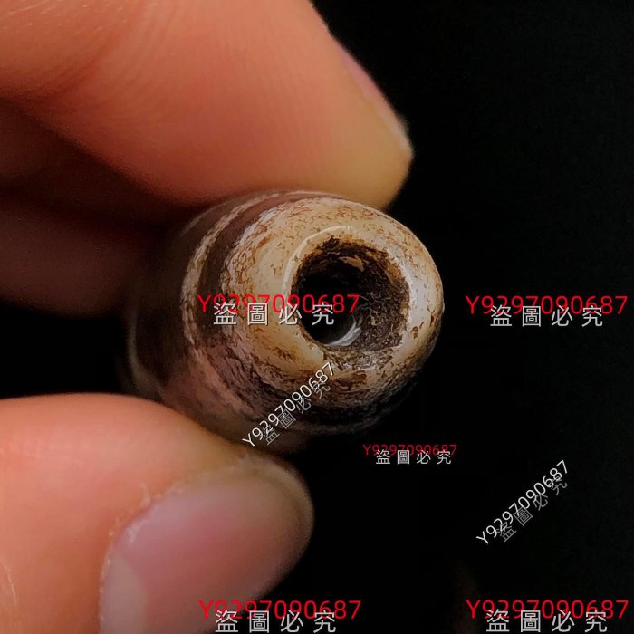 藏區回流老料至純古珠【五財神天珠】尺寸：56*13毫米重量15.5克天珠是