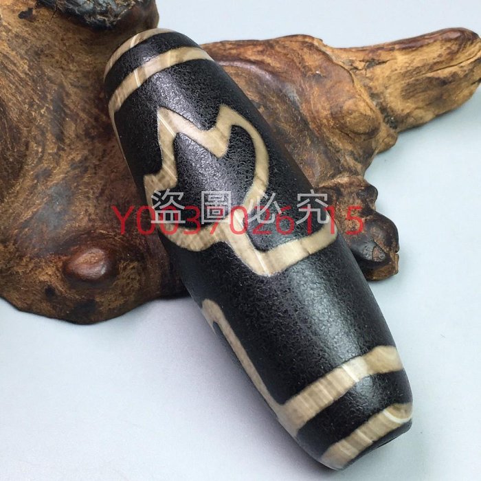 藏傳極品化水蓮花龍紋風化天珠,材質，瑪瑙玉髓，尺寸67.2×21.9左右古玩