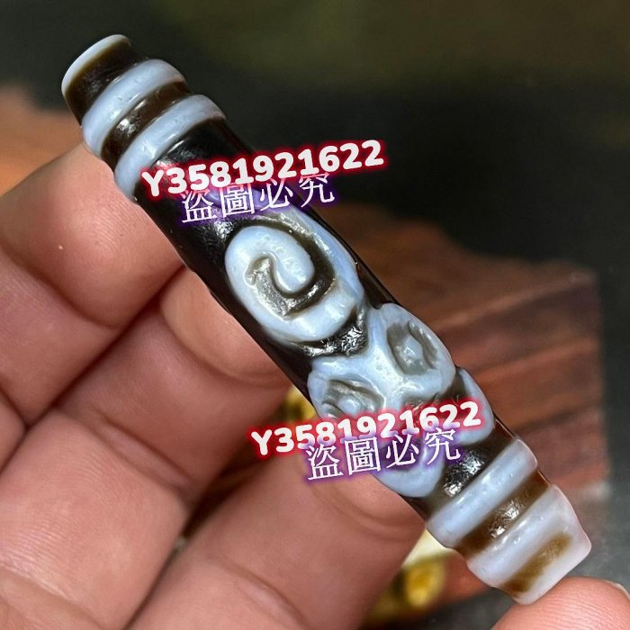 Q15650藏傳佛教高油包漿雕刻般若法眼天珠尺寸：57*12毫米風化