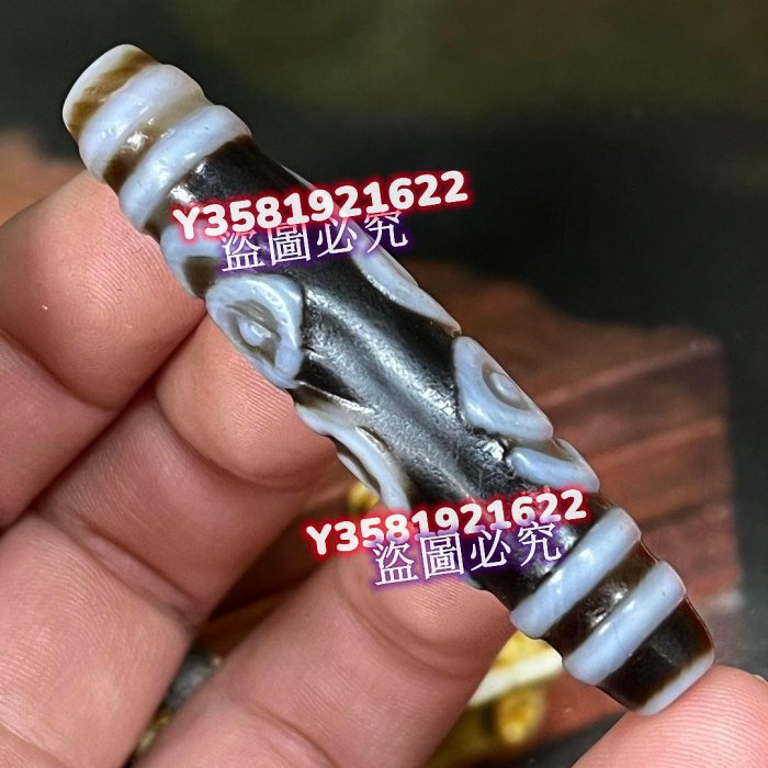 Q15650藏傳佛教高油包漿雕刻般若法眼天珠尺寸：57*12毫米風化清晰明顯