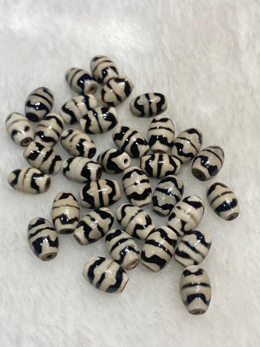 虎牙天珠稀有雙線虎牙天珠數量及其稀有正宗西藏老天珠風化紋明顯功效超