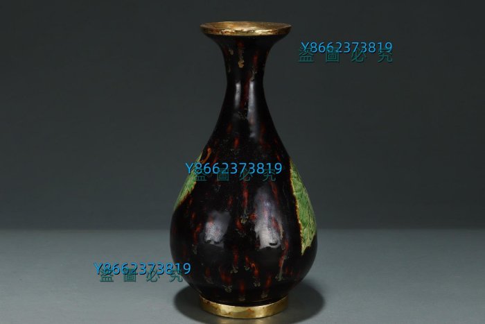 735 --- 宋代吉州窯包金黑釉樹葉紋玉壺春瓶。尺寸高：26厘米。腹徑：1