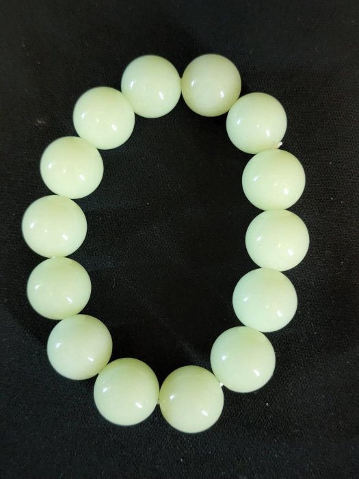 天然夜光石夜明珠開運招財驅邪風水手珠串夜明珠，亦稱“夜光石