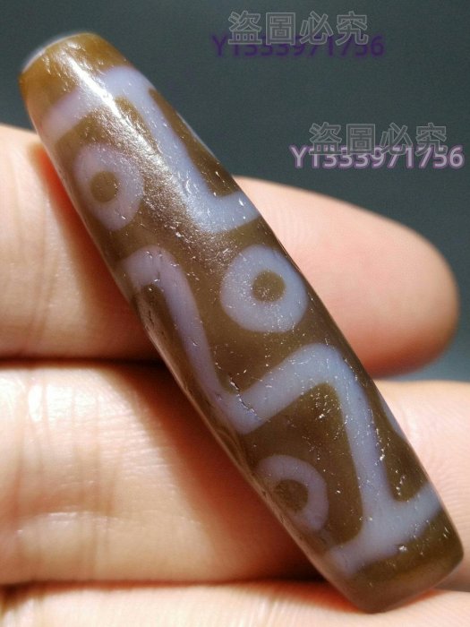 九眼天珠早年西藏回來一顆嫩色天珠很是稀少措絲天珠（珠體老縱收縮紋很