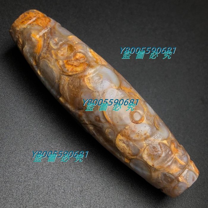 0260??藏區回流老料高油包漿【法螺連心三眼天珠】尺寸：74*20毫米重量