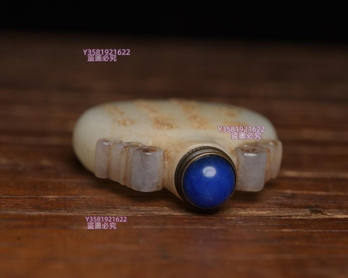 和田玉鼻煙壺4規格: 6.1×4.8×1.3厘米，重62克。 玉質溫潤細膩玉獸玉佩