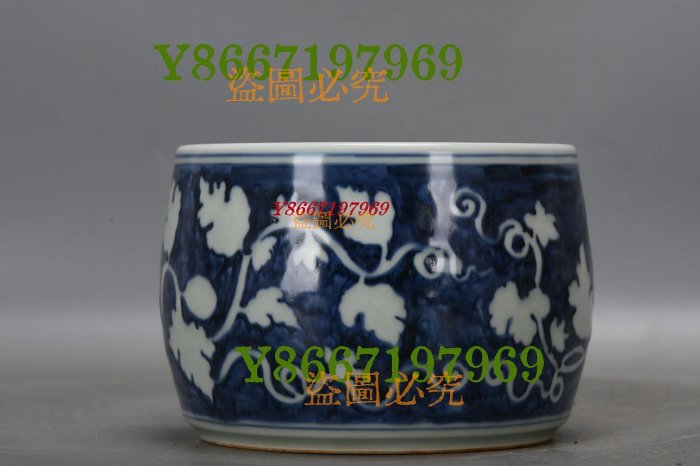明，宣德青花藍底留白西瓜紋蟋蟀罐高9.8厘米，口徑13厘米，肚徑14厘米