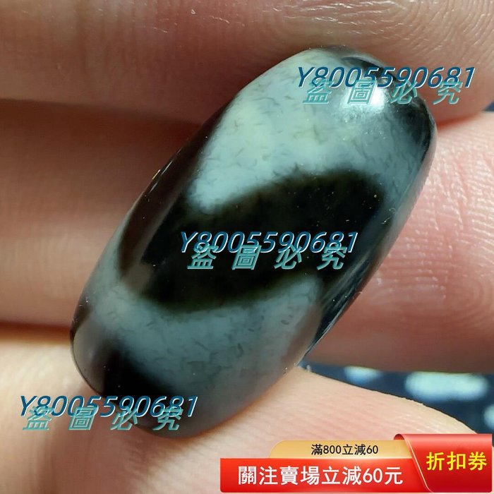 藍沁虎牙天珠藏傳古法通體白化手工珠。 尺寸20.6×11.7mm 編號z21 【景