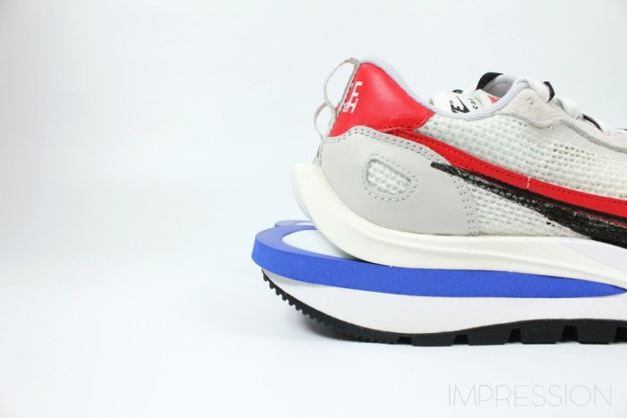 nike vaporwaffle royal fuchsia