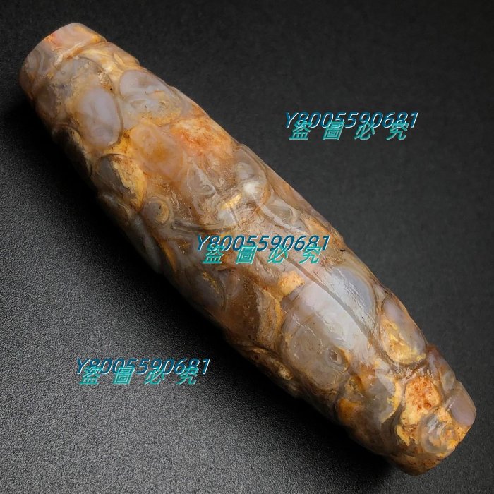 0260??藏區回流老料高油包漿【法螺連心三眼天珠】尺寸：74*20毫米重量