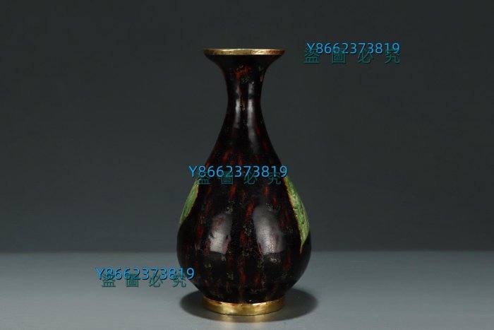 735 --- 宋代吉州窯包金黑釉樹葉紋玉壺春瓶。尺寸高：26厘米。腹徑：1