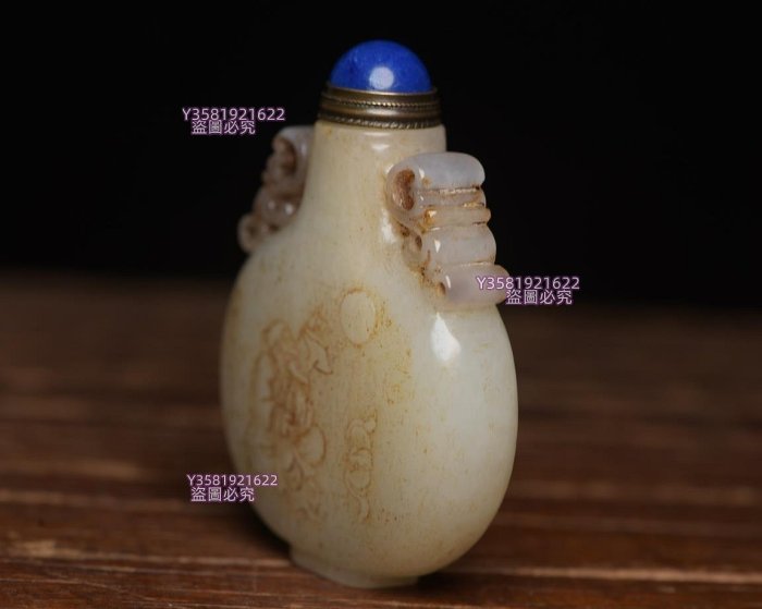 和田玉鼻煙壺4規格: 6.1×4.8×1.3厘米，重62克。 玉質溫潤細膩玉獸玉佩