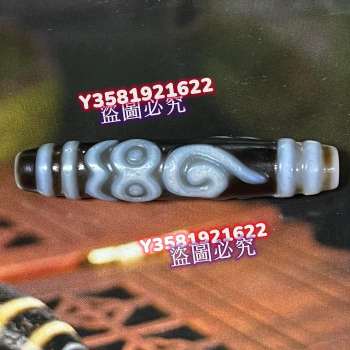 Q15650藏傳佛教高油包漿雕刻般若法眼天珠尺寸：57*12毫米風化