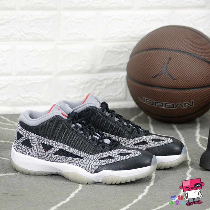 jordan 11 low black cement on feet