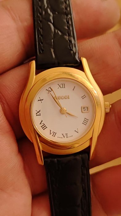GUCCI瑞士原裝包金GUCCI。錶身打有稀有全包