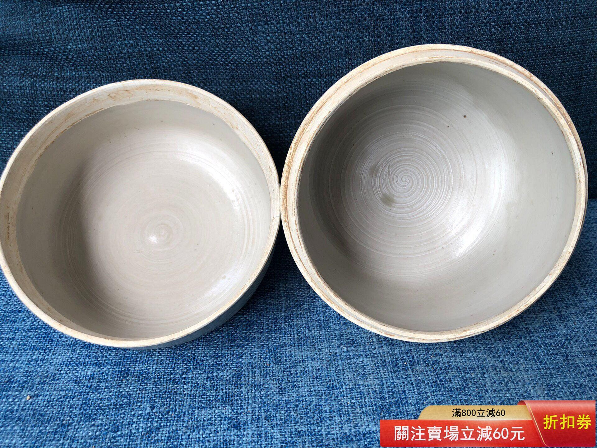 宋代定窯龍紋刻花蓋罐尚食局款整體完整白釉表面光滑細膩，龍紋刻花清晰