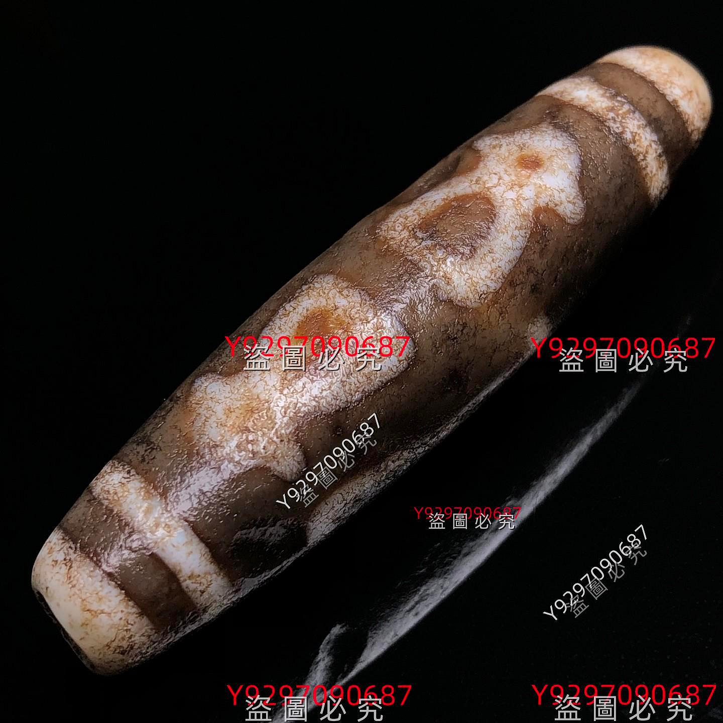 藏區回流老料至純古珠【五財神天珠】尺寸：56*13毫米重量15.5克天珠是