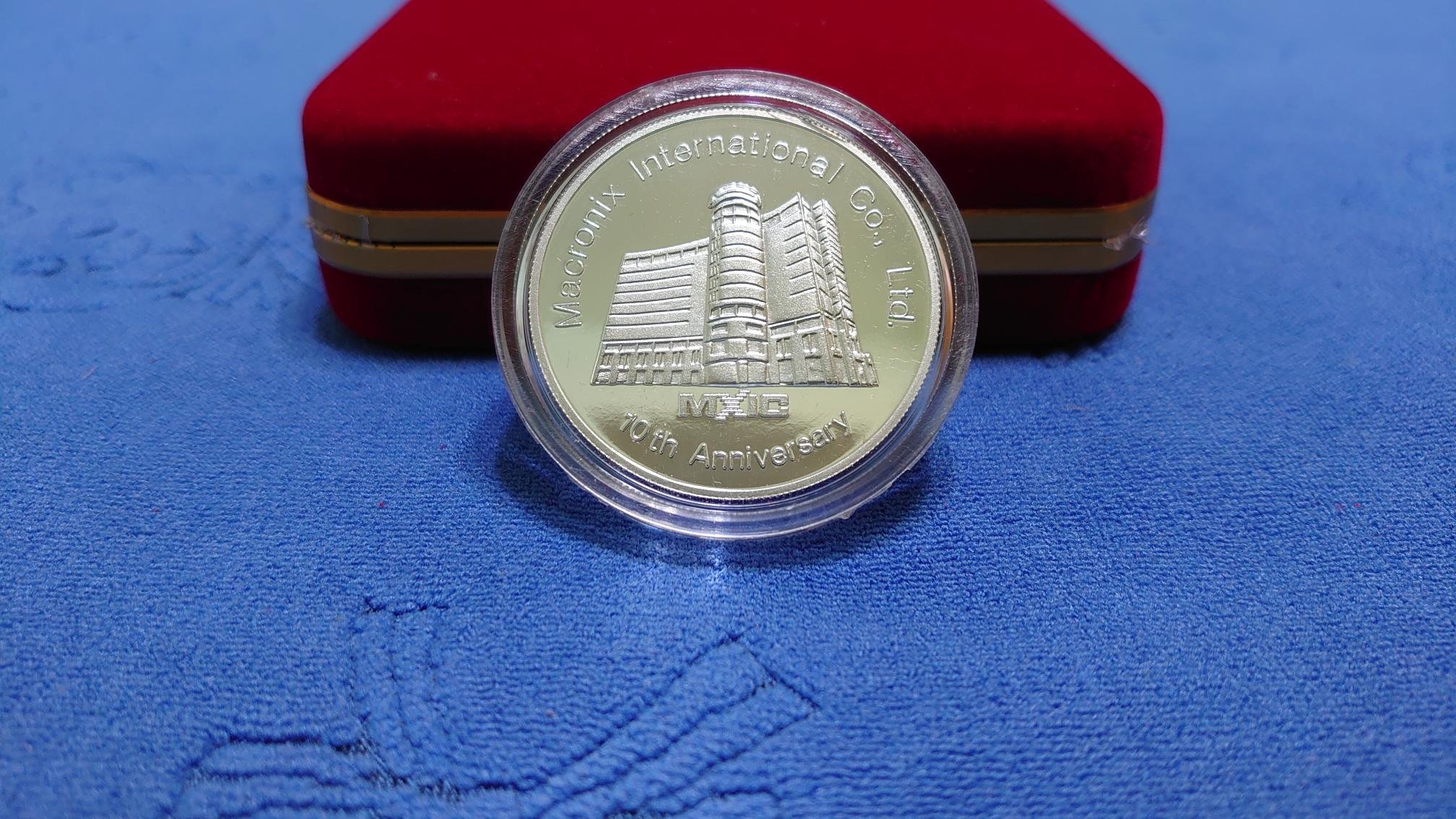 西元1999年發行，旺宏電子10週年紀念銀章，重1兩(37.5克)，純銀999，原