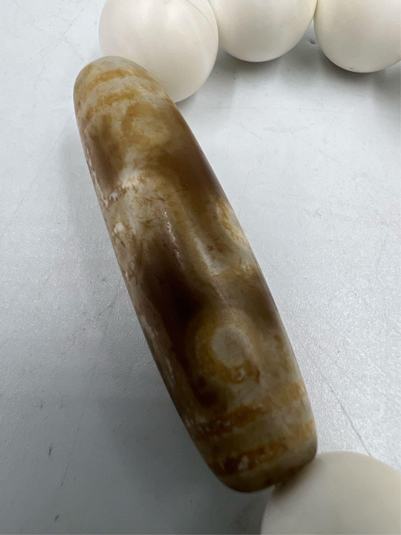 唐代老天珠白毫唐朝九眼老天珠管珠約4.8公分特殊天珠以硨磲珠為配珠串