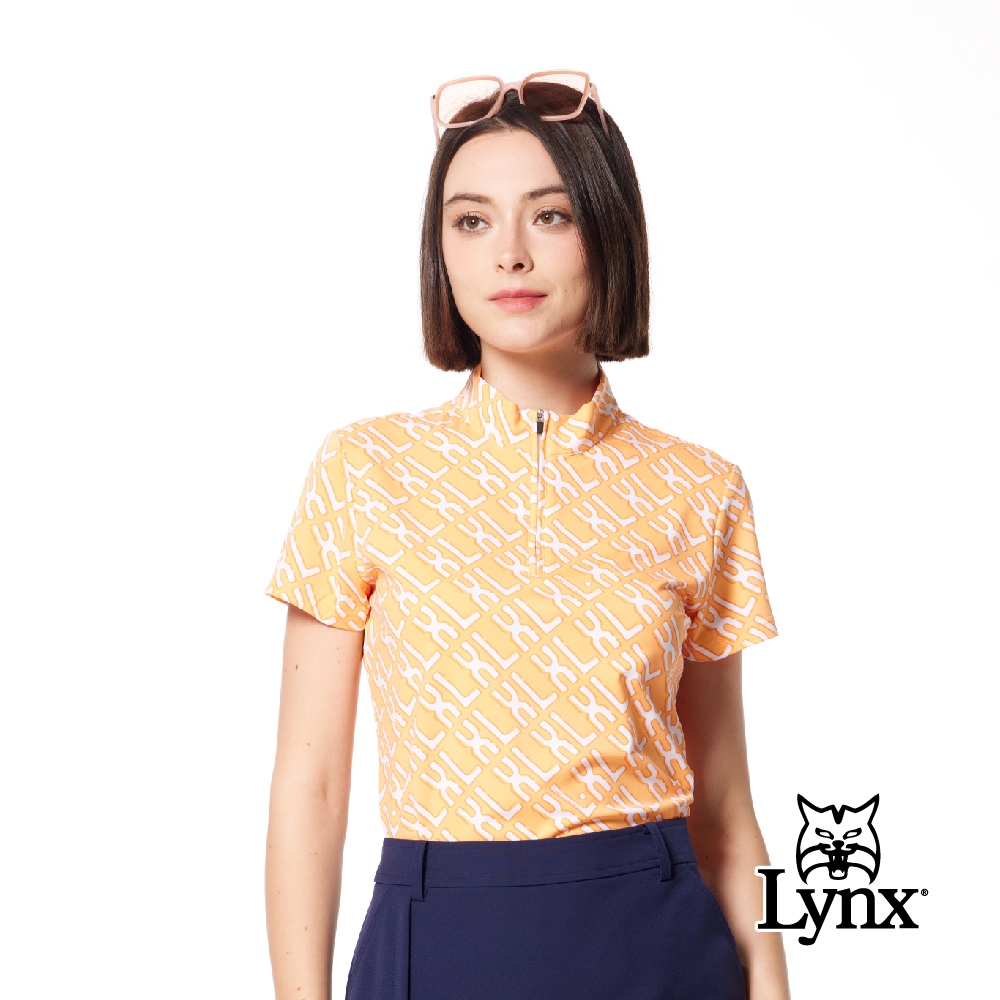 【Lynx Golf】女款吸溼排汗機能滿版英文字樣印花Lynx繡花短袖立領POLO衫/高爾夫球衫-橘色 (橘色)