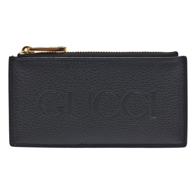 GUCCI古馳經典品牌LOGO雙色牛皮拉鍊卡夾，採用高品質牛皮製成，內外層均為牛皮材質，設計簡約大方，擁有5個內部夾層，適合存放零錢、卡片等日常用品。拉鍊式開口，安全實用，附原廠包裝盒與說明書，來自義大利製造，歐洲進口，男女皆可使用，是時尚與實用兼具的精品零錢包。