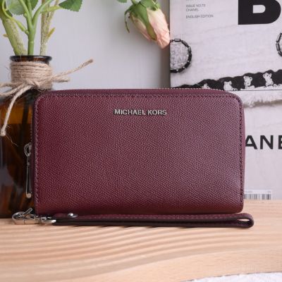 MICHAEL KORS Jet Set荔枝皮革手掛式拉鍊中夾(酒紅)