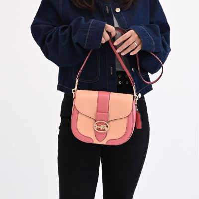 COACH Georgie 金屬馬車LOGO拼色翻蓋斜背馬鞍包(玫粉)