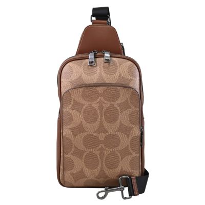 COACH 經典LOGO滿版印花單肩後背包/胸口包(咖)