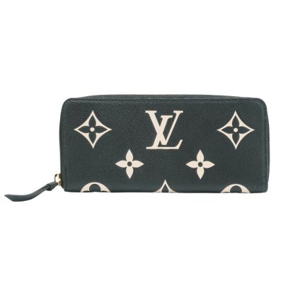 LV LOUIS VUITTON 經典 Clemence Empreinte 雙色皮革拉鍊長夾，採用高階牛皮製成，黑色系設計時尚大方，拉鍊式開口方便使用，內設12個夾層與1個內袋，適合日常攜帶與裝飾，原廠防塵套與包裝盒完整，法國原產，歐洲來源，女性必備的高階手提包。
