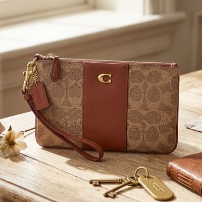 COACH PVC拼牛皮Signature系列拉鍊式手拿包(焦糖棕x卡其x銹紅)