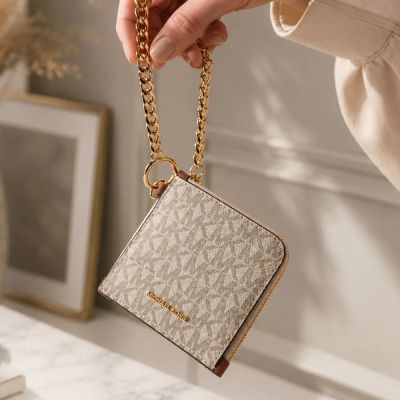 【Michael Kors】Jet Set Travel 經典滿版老花Logo 防刮皮革附鍊帶證件夾/零錢包(米白色)
