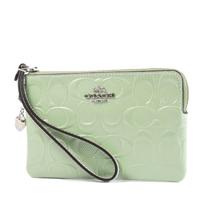 COACH 漆皮浮雕LOGO手拿包-綠色/附愛心掛飾