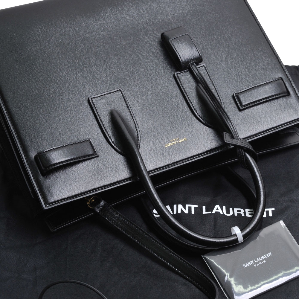 YSL Saint Laurent Sac De Jour 小牛皮手提斜背風琴包(黑色/398709