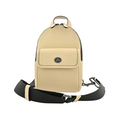 COACH象牙色素面皮革前口袋小款單肩胸背斜後背男包