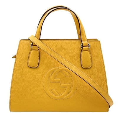全新GUCCI古馳經典大雙G LOGO黃色牛皮手提斜背兩用包，來自義大利歐洲專櫃購入，配有專櫃防塵套與購買證明，內附帆布內袋，拉鍊式開口設計，輕便實用，適合女性日常出勤與休閒使用。